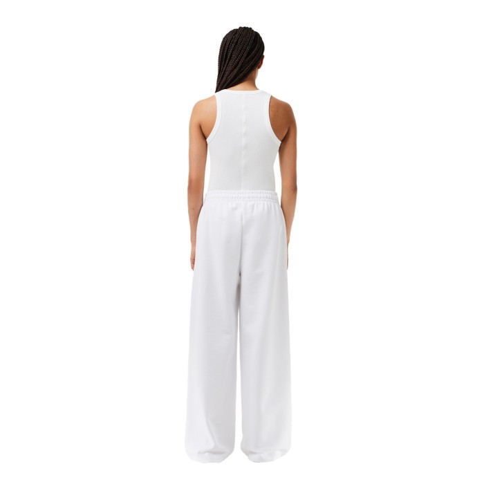 брюки tracksuit trousers от бренда lacoste вид слева