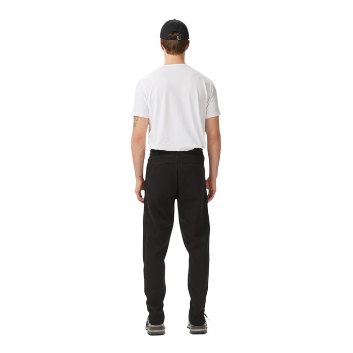 брюки tracksuit trousers от бренда lacoste вид слева