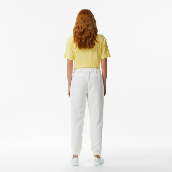 брюки trousers от бренда lacoste вид слева