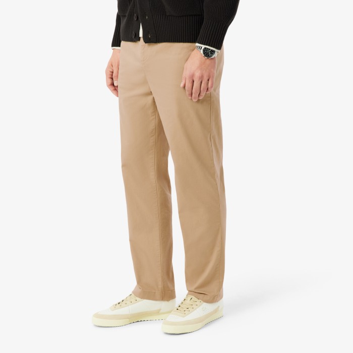 брюки trousers от бренда lacoste вид слева