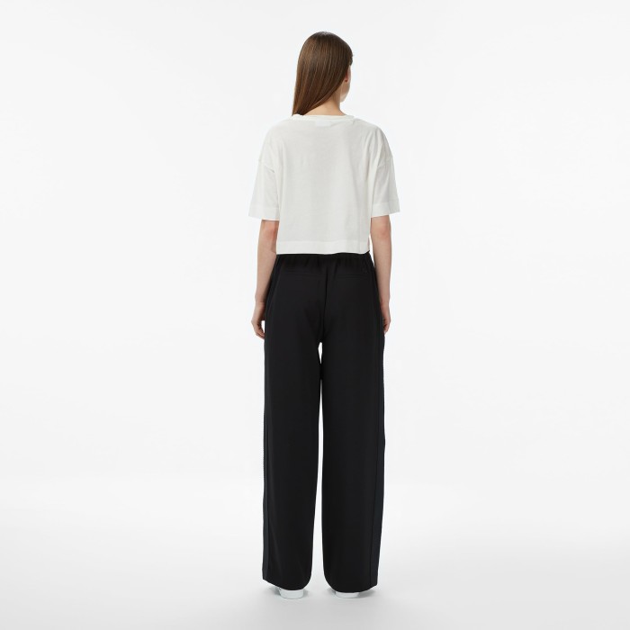 брюки trousers от бренда lacoste вид слева