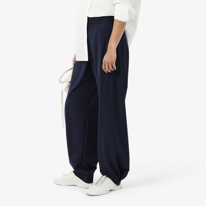 брюки trousers от бренда lacoste вид слева