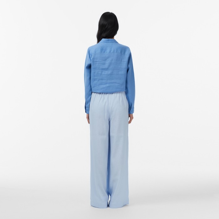 брюки trousers от бренда lacoste вид слева