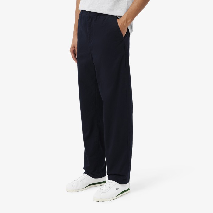 брюки trousers от бренда lacoste вид слева