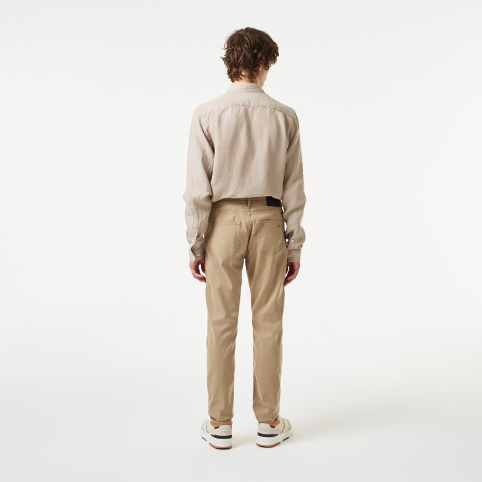 брюки trousers от бренда lacoste вид слева
