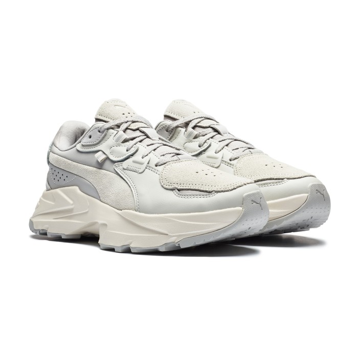 кроссовки orkid selflove от бренда puma вид слева