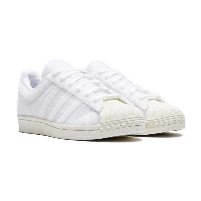 кроссовки superstar от бренда adidas вид слева