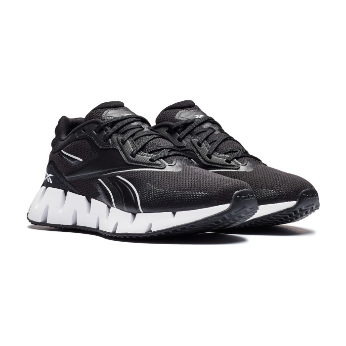 кроссовки zig dynamica 4 от бренда reebok вид слева