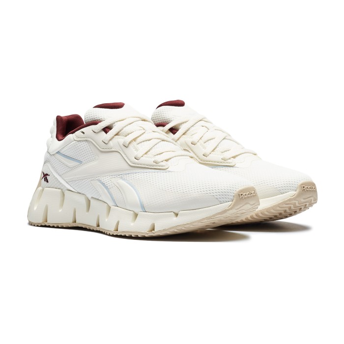 кроссовки zig dynamica 4 от бренда reebok вид слева