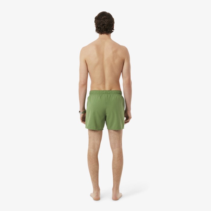 купальные шорты swimsuit от бренда lacoste вид слева