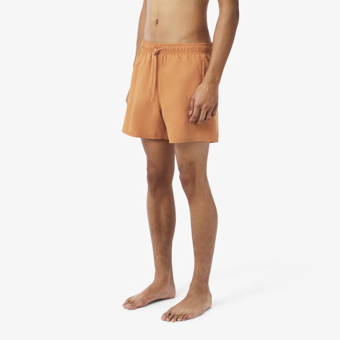 купальные шорты swimsuit от бренда lacoste вид слева
