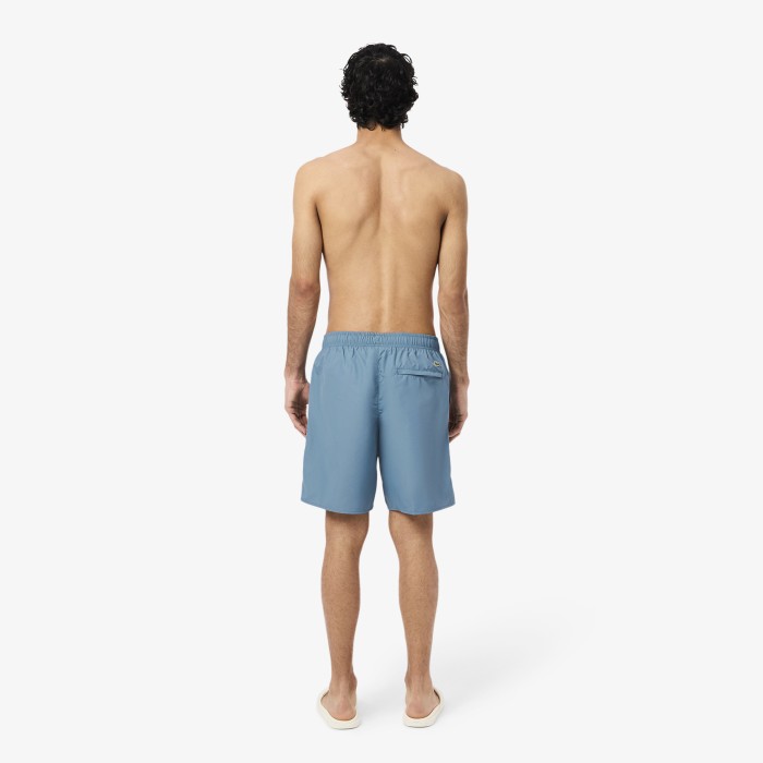 купальные шорты swimwear от бренда lacoste вид слева