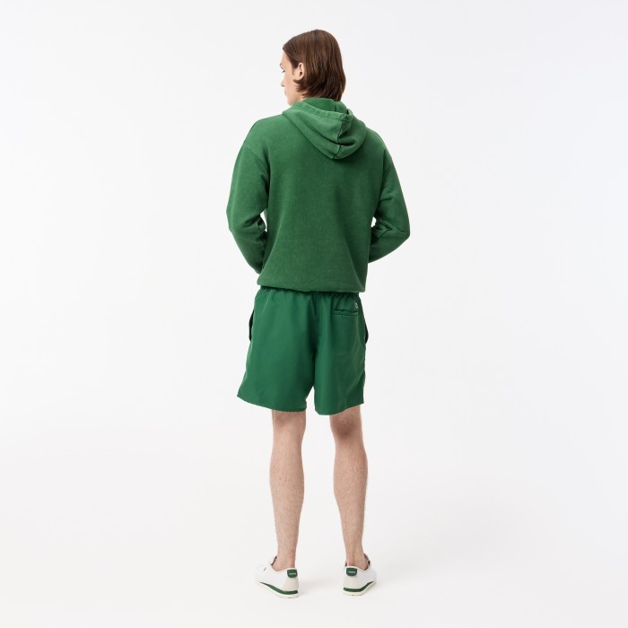 купальные шорты swimwear от бренда lacoste вид слева