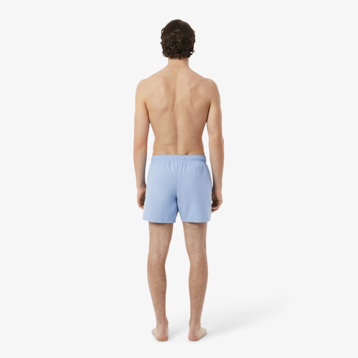 купальные шорты swimwear от бренда lacoste вид слева