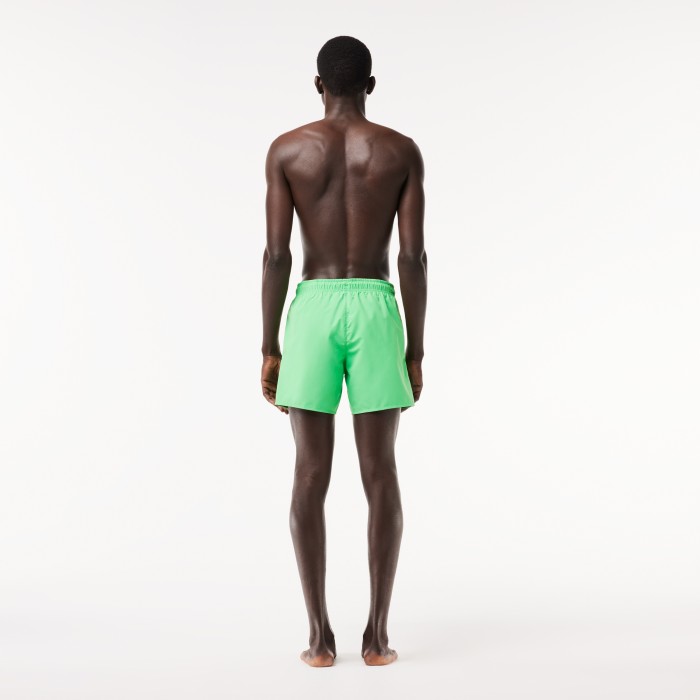 купальные шорты swimwear от бренда lacoste вид слева