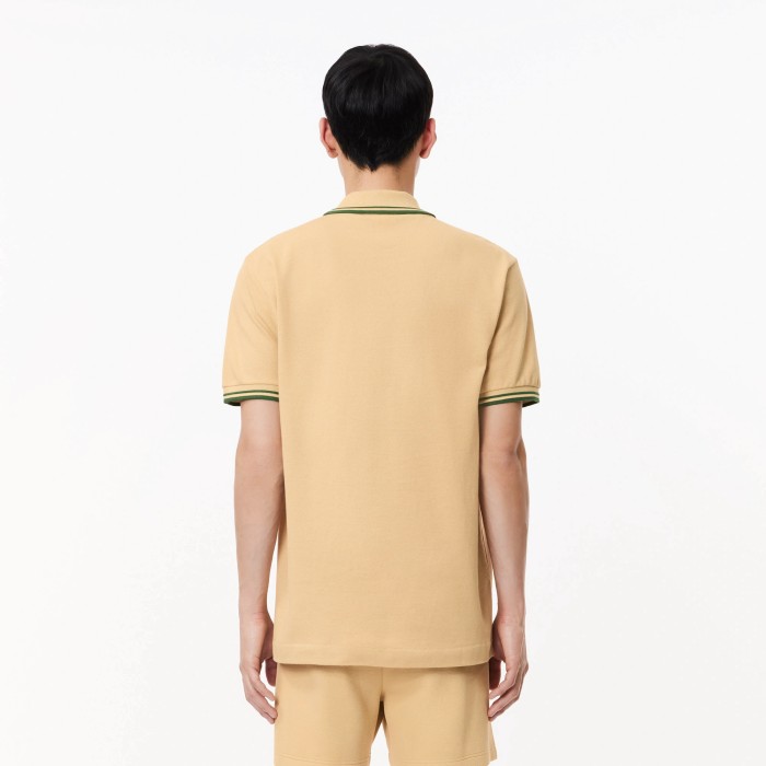 поло мужское поло lacoste original l.12.12 из органического хлопка от бренда lacoste вид слева