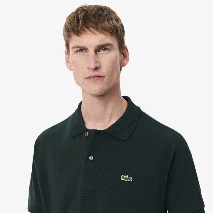 поло polo от бренда lacoste вид слева