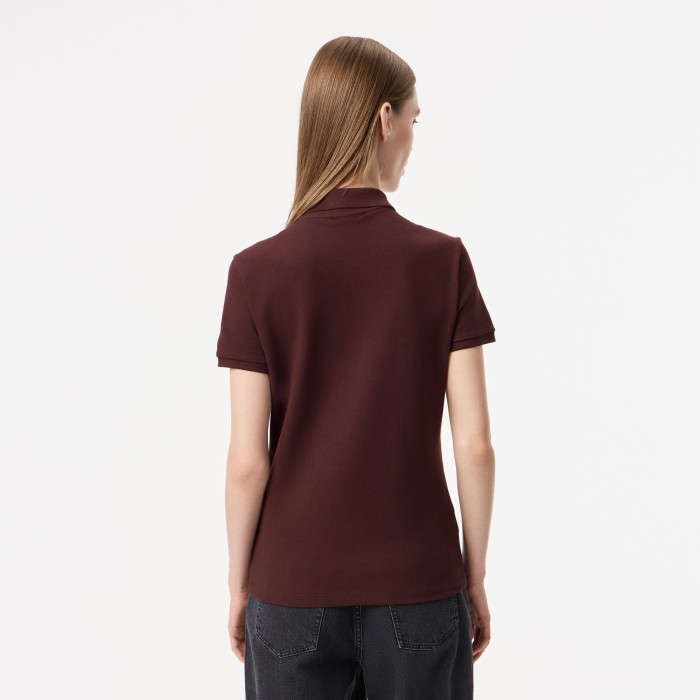 поло polo от бренда lacoste вид слева