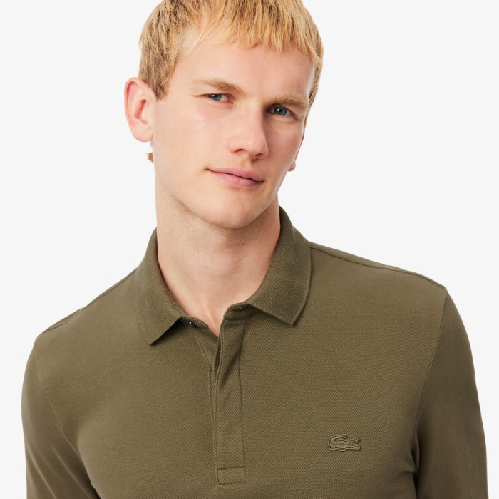 поло polo от бренда lacoste вид слева