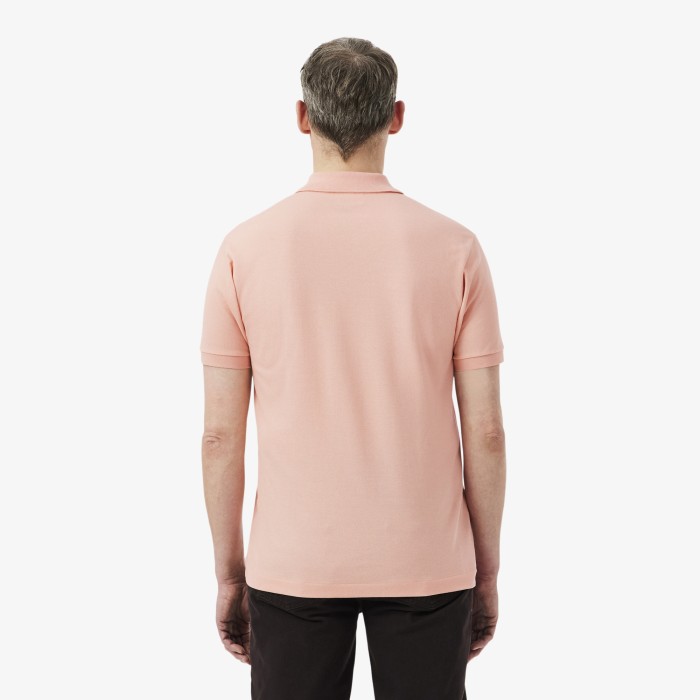 поло polo от бренда lacoste вид слева