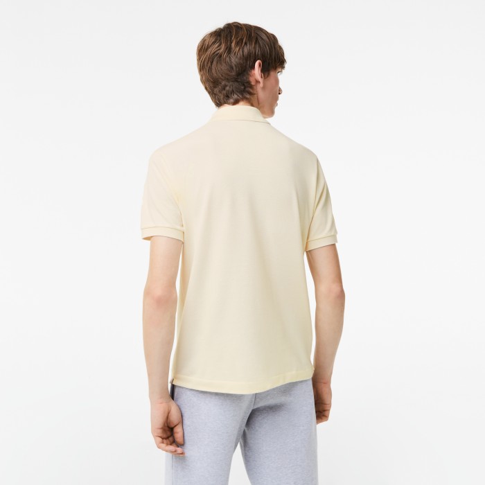 поло polo от бренда lacoste вид слева
