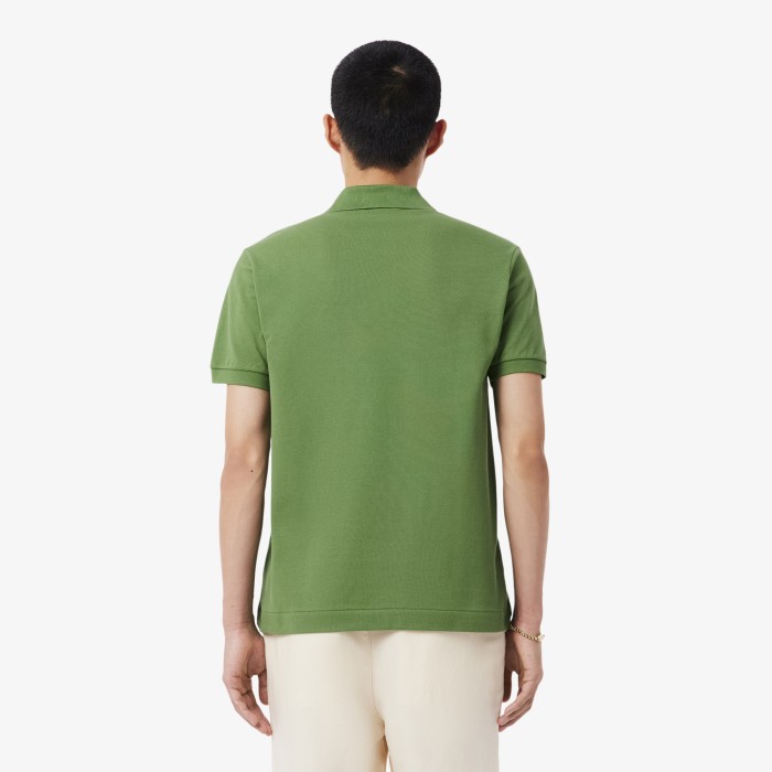 поло polo от бренда lacoste вид слева