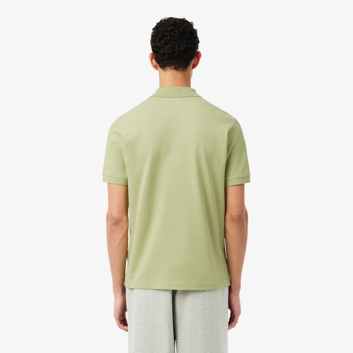 поло polo от бренда lacoste вид слева