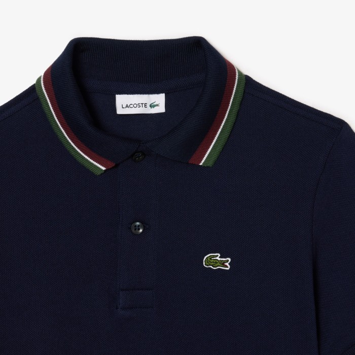 поло polo от бренда lacoste вид слева