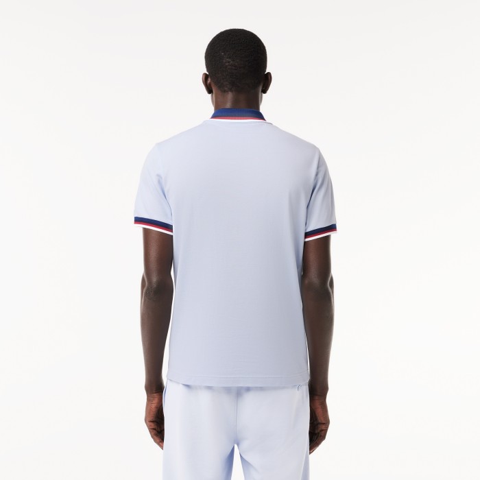 поло polo от бренда lacoste вид слева