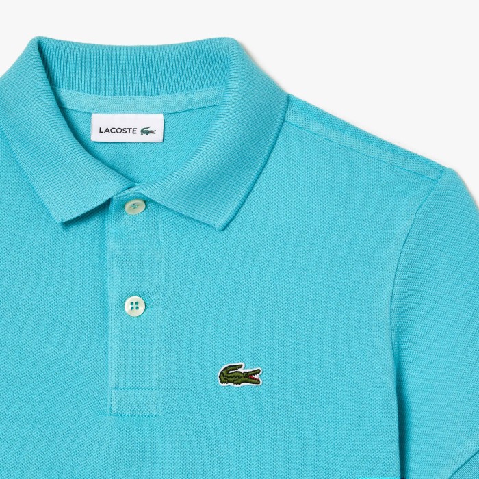 поло polo от бренда lacoste вид слева