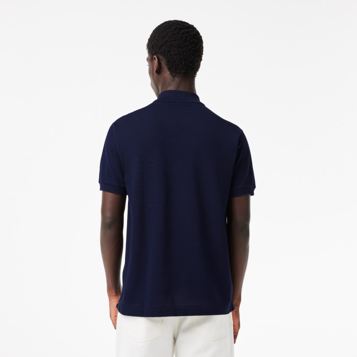 поло polo от бренда lacoste вид слева