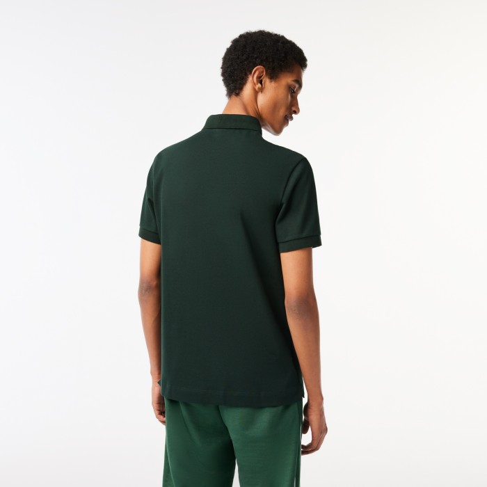 поло polo от бренда lacoste вид слева