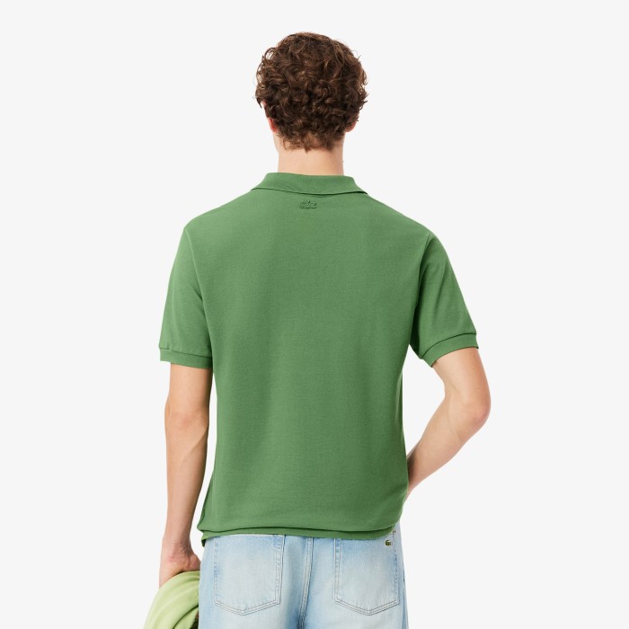 поло polo от бренда lacoste вид слева