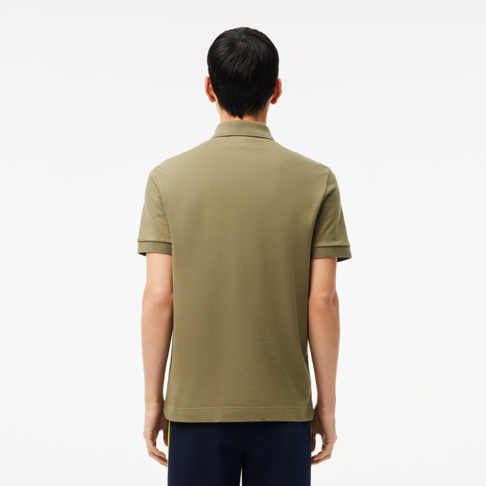 поло polo от бренда lacoste вид слева