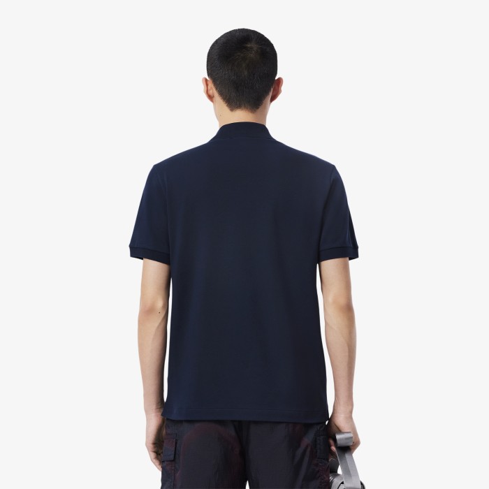 поло polo от бренда lacoste вид слева