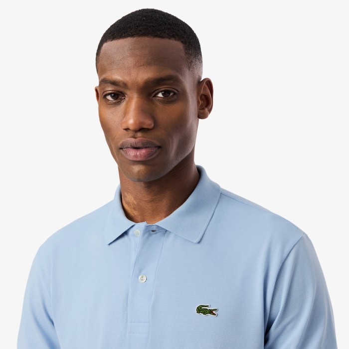 поло polo от бренда lacoste вид слева