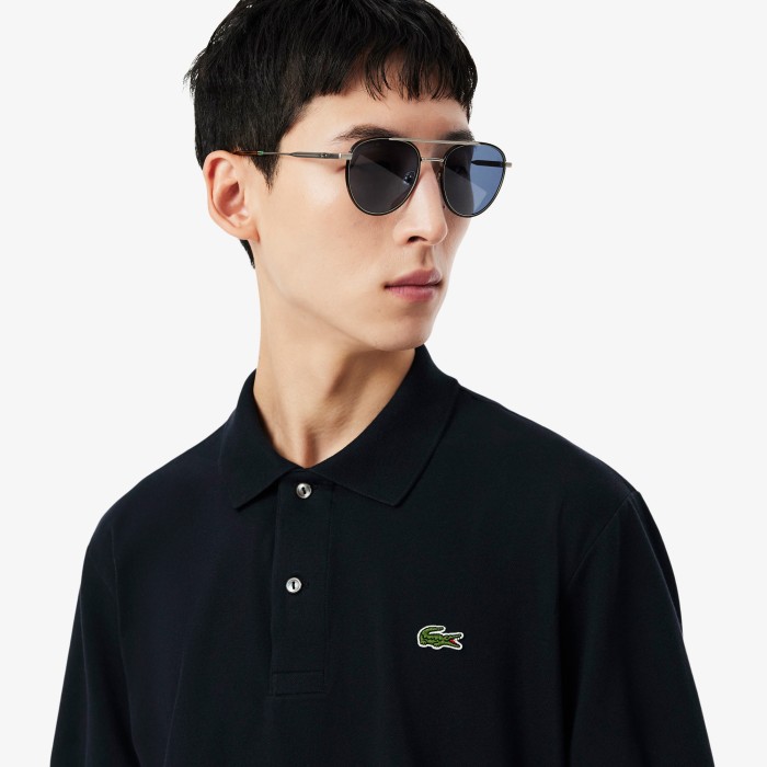 поло polo от бренда lacoste вид слева