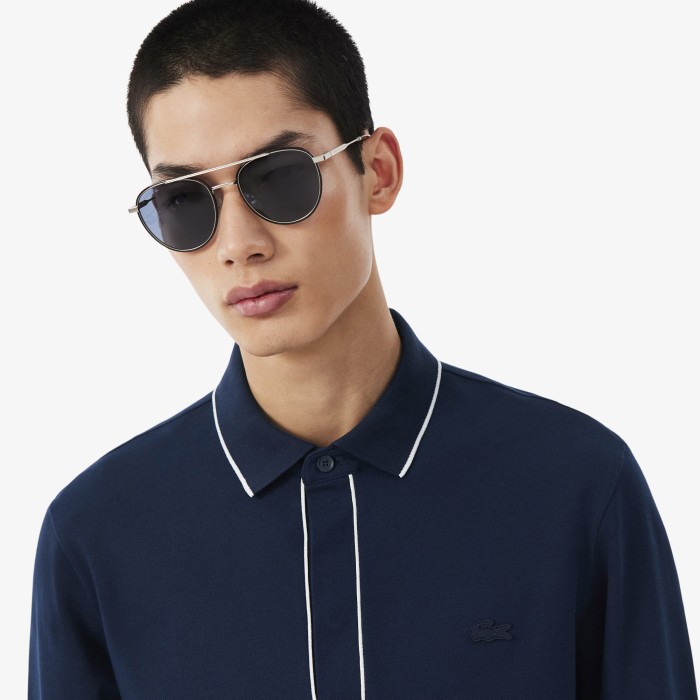 поло polo от бренда lacoste вид слева