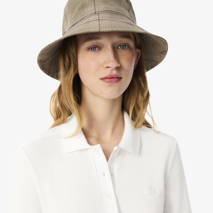 поло polo от бренда lacoste вид слева