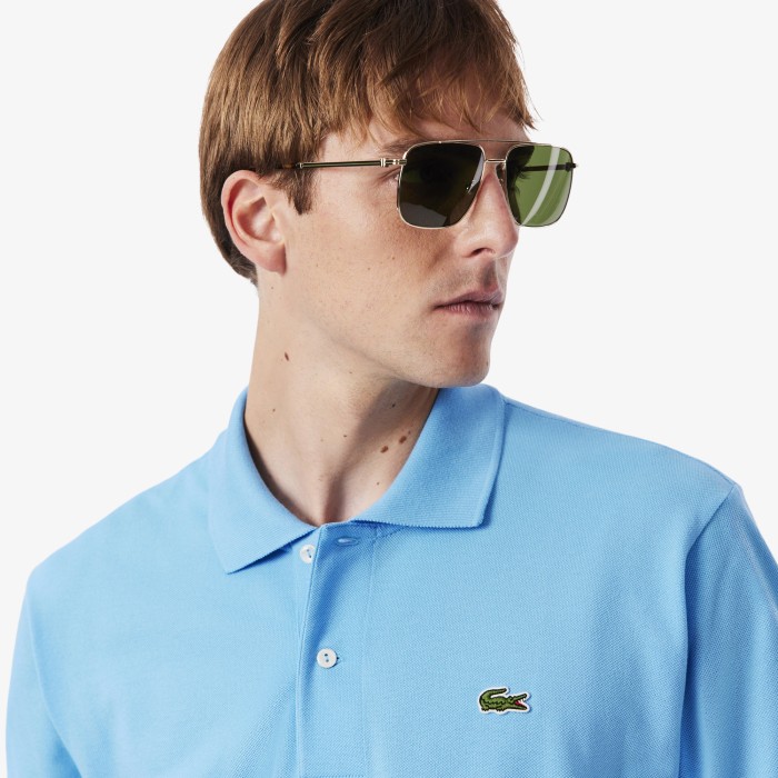 поло polo от бренда lacoste вид слева