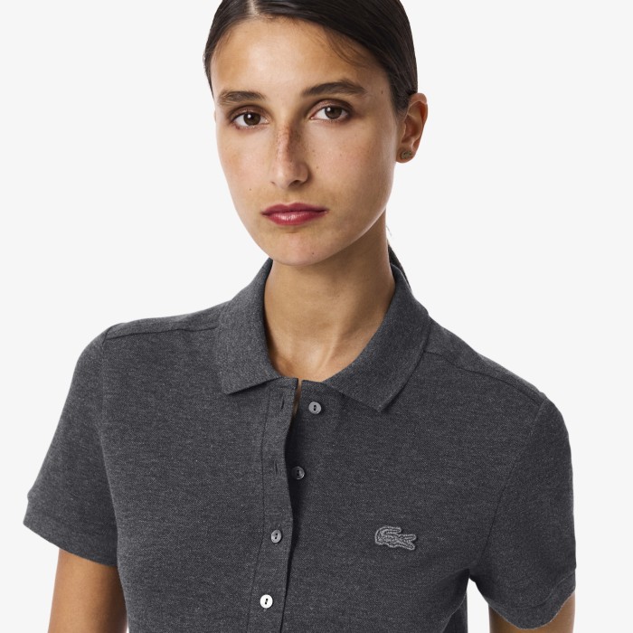 поло polo от бренда lacoste вид слева