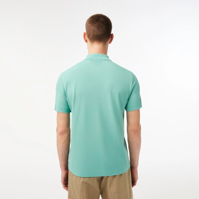 поло polo от бренда lacoste вид слева