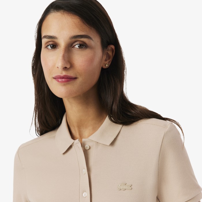 поло polo от бренда lacoste вид слева