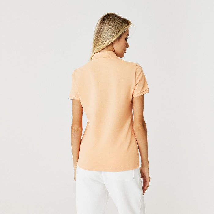 поло polo от бренда lacoste вид слева