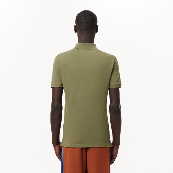 поло polo от бренда lacoste вид слева