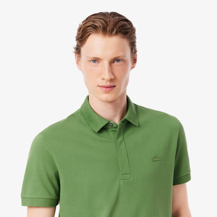 поло polo от бренда lacoste вид слева