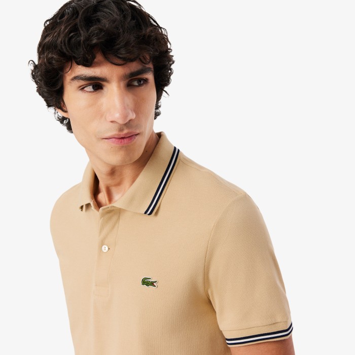 поло polo от бренда lacoste вид слева