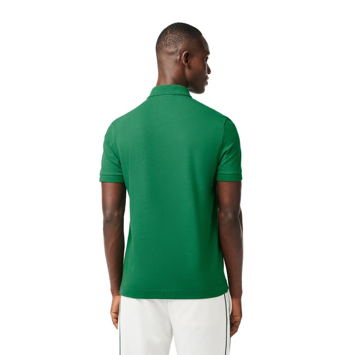 поло polo от бренда lacoste вид слева