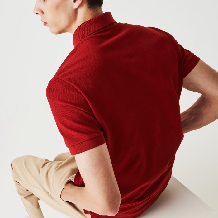 поло polo от бренда lacoste вид слева