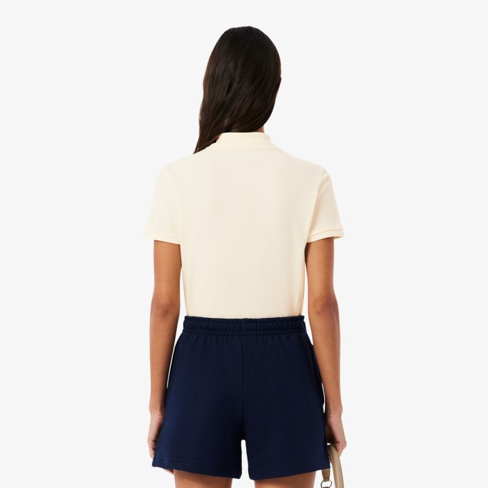 поло polo от бренда lacoste вид слева